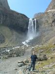 Ally under the waterfall